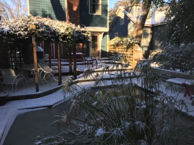 Winter view to house and pond from the cottage Winter view to house and pond from the cottage
