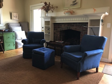 Chairs on either side of fireplace Chairs on either side of fireplace